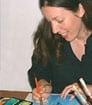 Headshot photo of author MLP illustrating one of her books